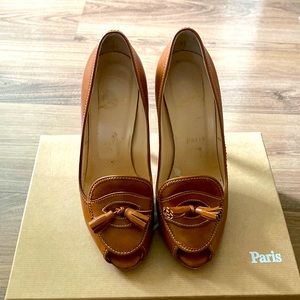 Christian Louboutin brown peep toe pumps. Wooden heel